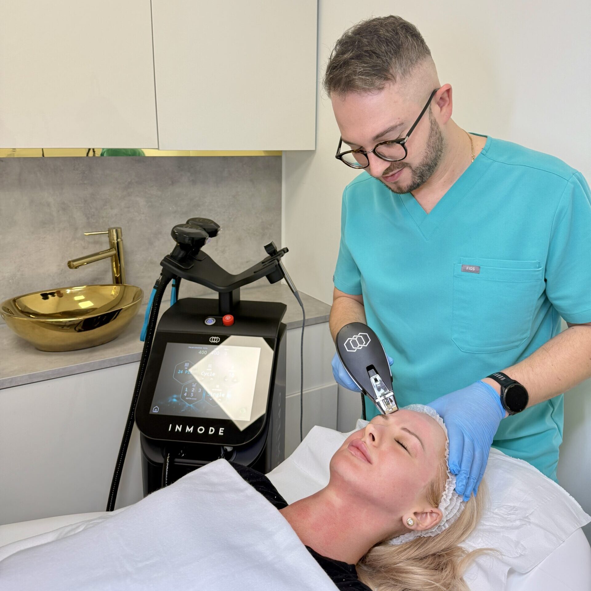 dermatologist providing skin tightening treatment with morpheus8